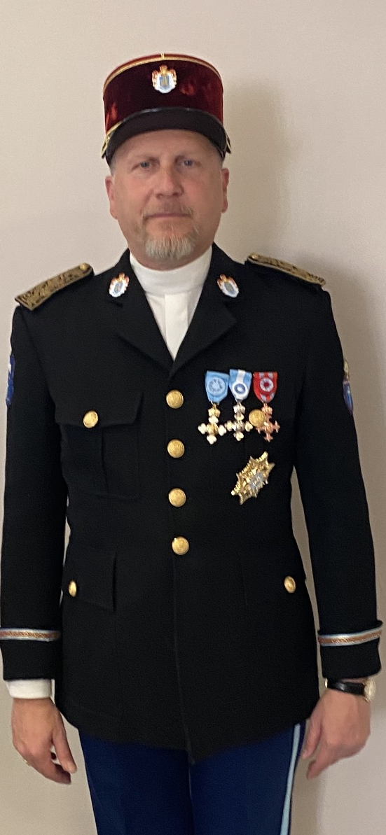 H.M.R.H. Msgr. Giovanni Luca, Commander General