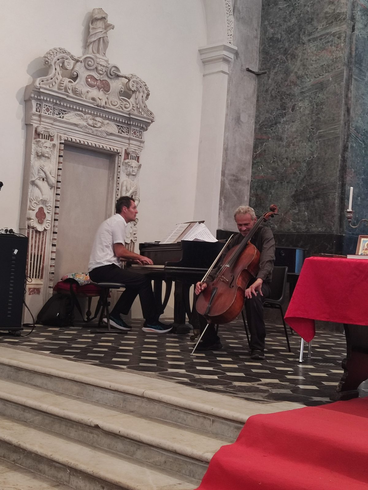 The musicians in front of the abbey's carved portal